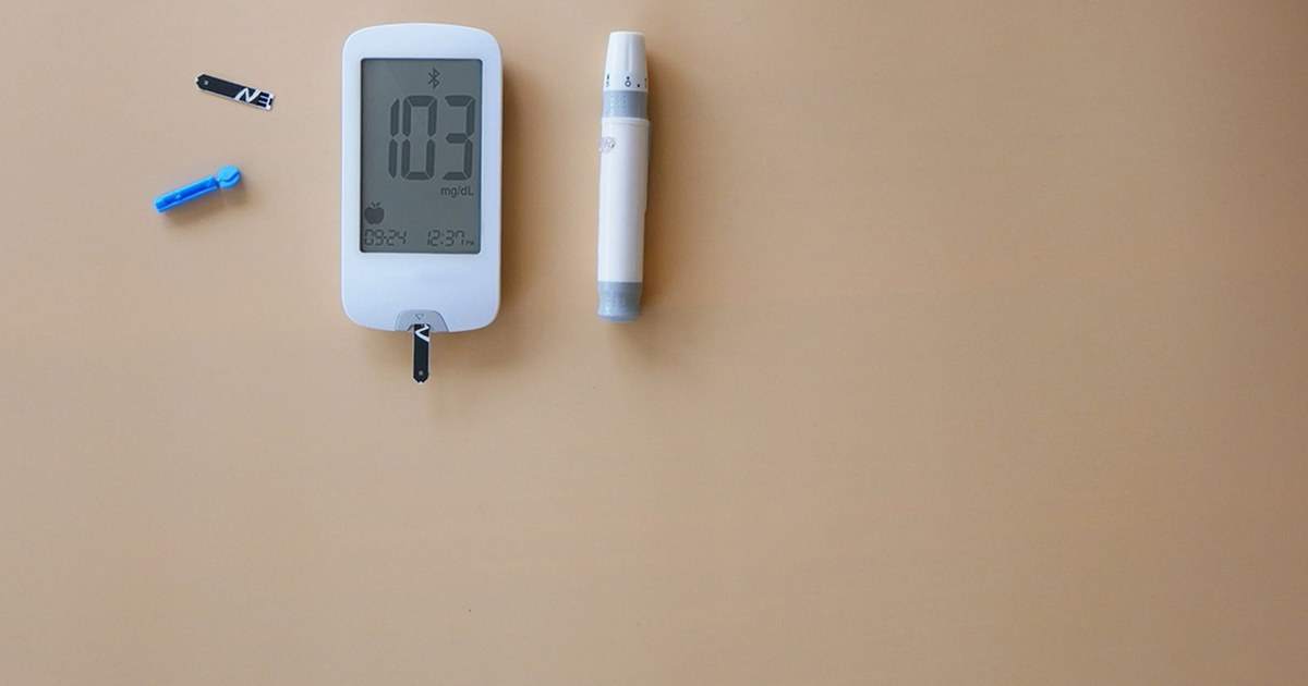 A blood glucose meter with a test strip