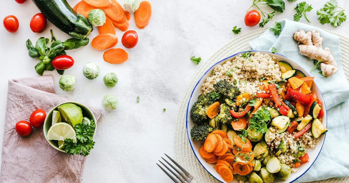 A colorful quinoa and fresh vegetable salad bowl