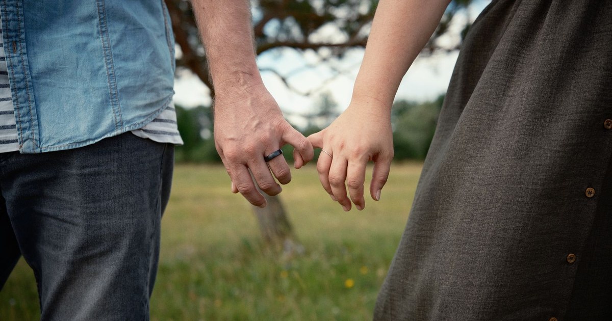 A couple holding hands